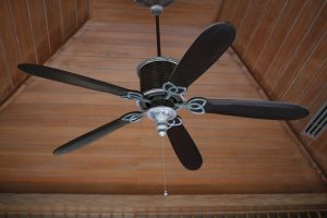 Running your ceiling fans in the opposite direction will push heated air down from the ceiling.